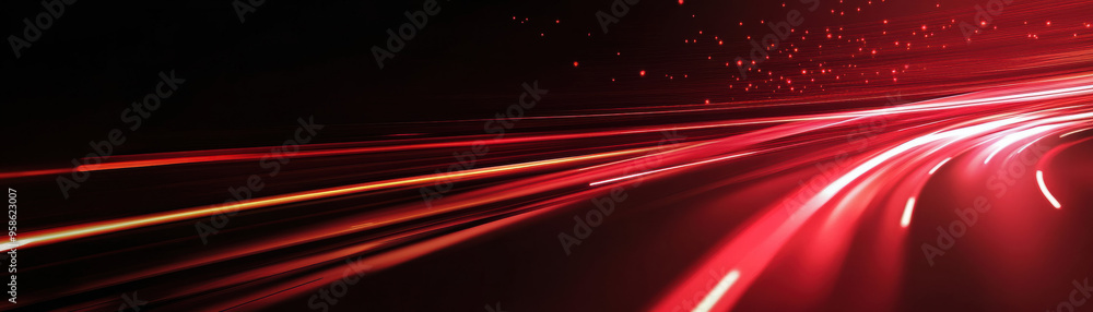 Dynamic red light trails on a dark background, depicting speed, motion ...