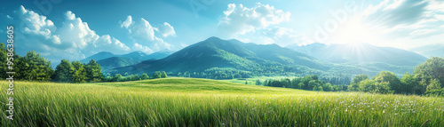 Panoramic view of a sunlit meadow with green hills and clear blue sky, perfect for nature and outdoor scene lovers.