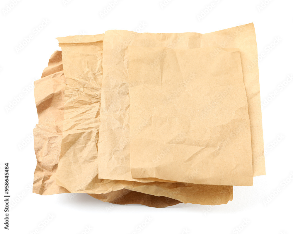 Crumpled kraft paper sheets isolated on white Crumpled kraft paper sheets isolated on white