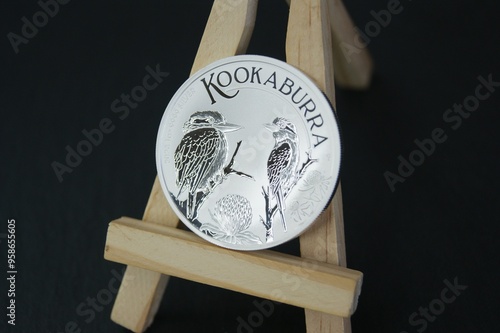 1 dollar Australian Kookaburra 2023. Australian investment coin on easel. Investments and numismatics.