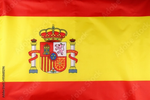 Wallpaper Mural The national flag of Spain with its vibrant colors and coat of arms prominently displayed Torontodigital.ca