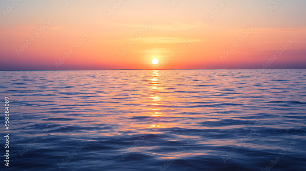 Fototapeta premium Sunrise over a calm ocean horizon 