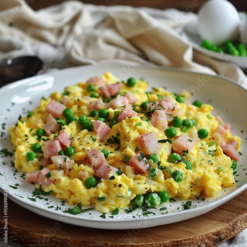 Revuelto Gramajo – Scrambled eggs with ham and peas.