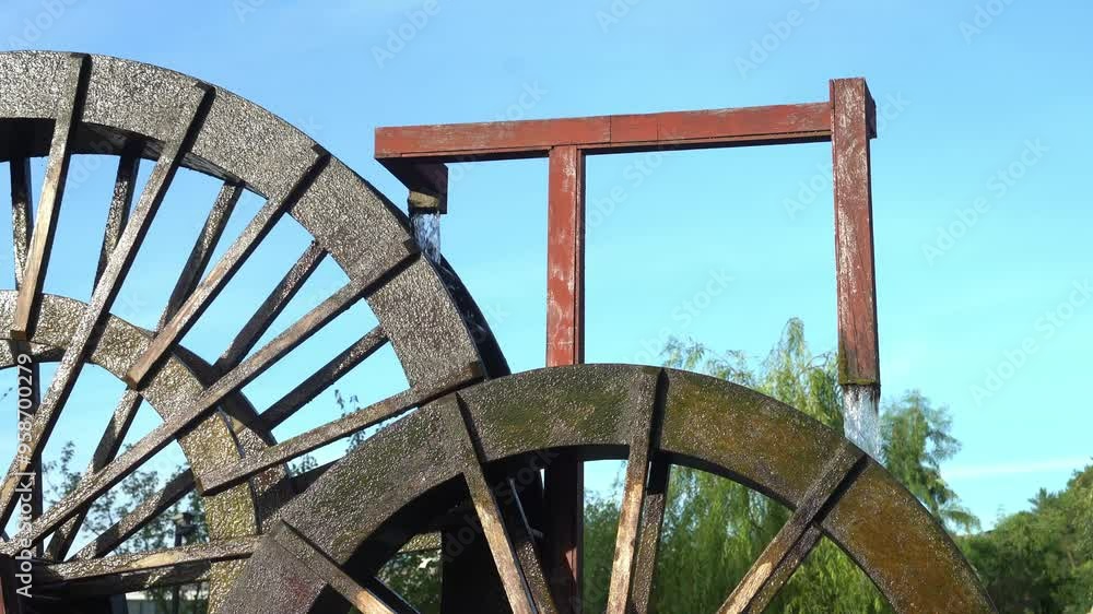 ancient wooden wheel irrigation equipment in park ancient wooden wheel irrigation equipment in park