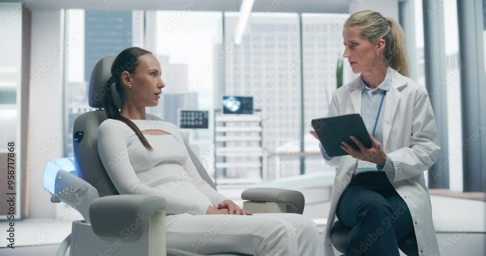 Female Doctor Consults With Female Patient in a High-tech Medical Clinic, Discussing Advanced Healthcare Solutions. Futuristic Setting Features Advanced Technology and Modern Design. Female Doctor Consults With Female Patient in a High-tech Medical Clinic, Discussing Advanced Healthcare Solutions. Futuristic Setting Features Advanced Technology and Modern Design.