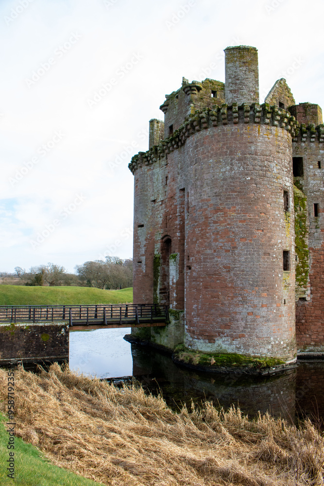 Old Castle with a moat and bridge Old Castle with a moat and bridge