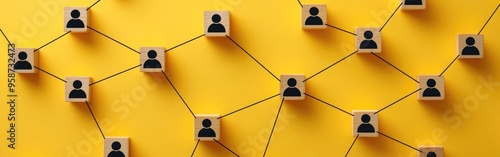 Wooden blocks with people icons are linked by lines, representing business relationships on yellow