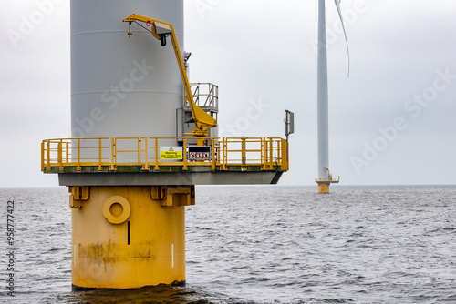 Offshore windfarm near Dutch coast with cloudy sky