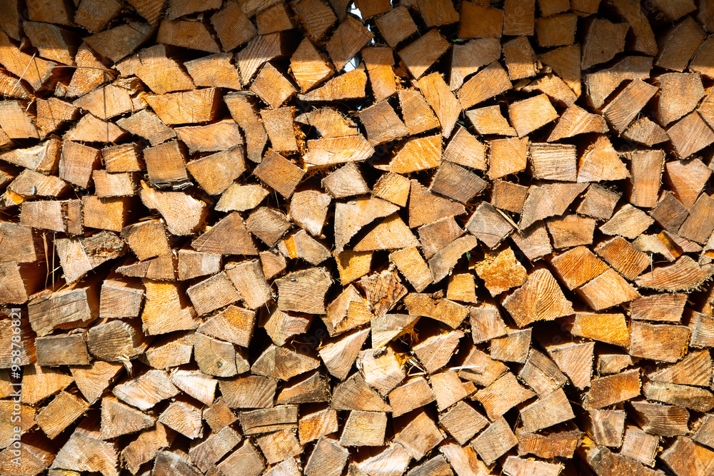 a stack of chopped firewood in alps a stack of chopped firewood in alps