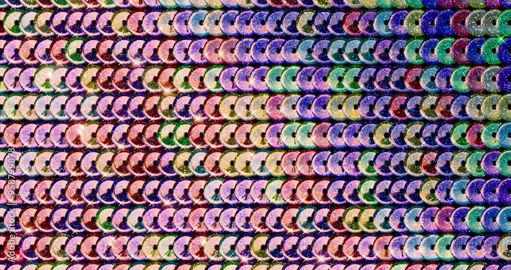 Colorful sequins turn up in a wave pattern. Gorgeous background images. Top view. 3D rendering 4K loop animation. Colorful sequins turn up in a wave pattern. Gorgeous background images. Top view. 3D rendering 4K loop animation.