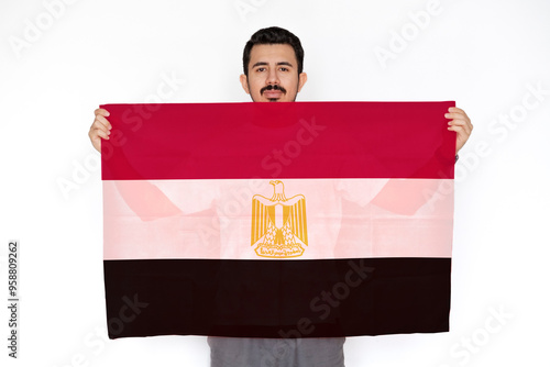 Young man holding Egypt flag, celebration or campaigning concept, independence day idea, two hands 