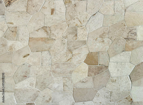 Light beige flagstone or flat paving stone texture tile slabs. Sedimentary flagstone or commonly known as Palimanan stone in Indonesia, is usually cut in irregular shapes used as finishing to walls