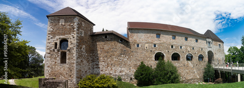 Panoramic view of Pipers' Tower and Archers' Tower with castle gate in Ljubljana castle with modern bridge in Slovenia photo