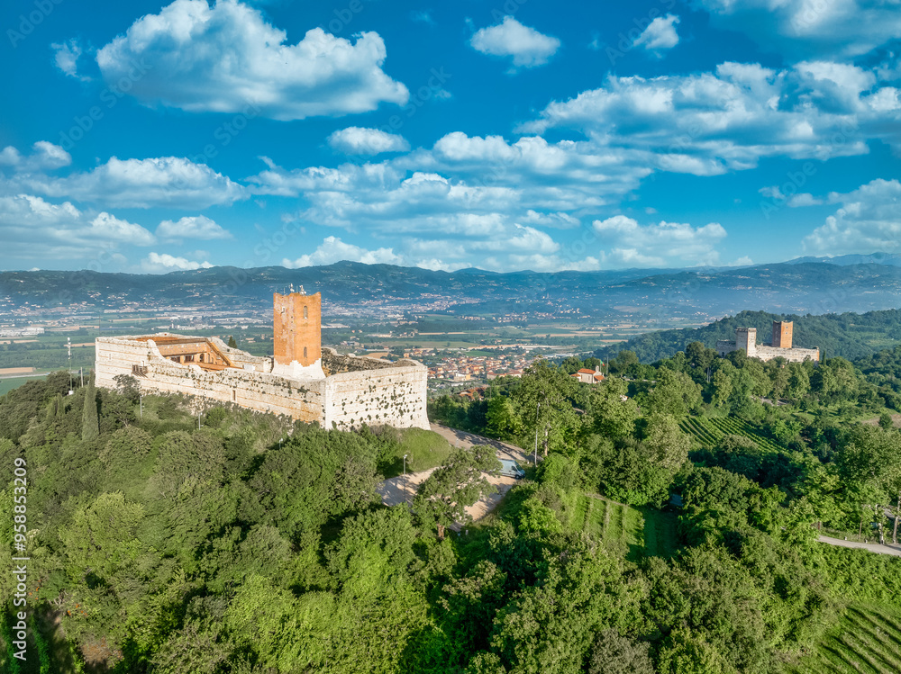 Obraz premium Aerial view of Romeo and Juliet castles in Montecchio Maggiore, rare pair of mountain fortifications in Italy with square towers functioning theater 
