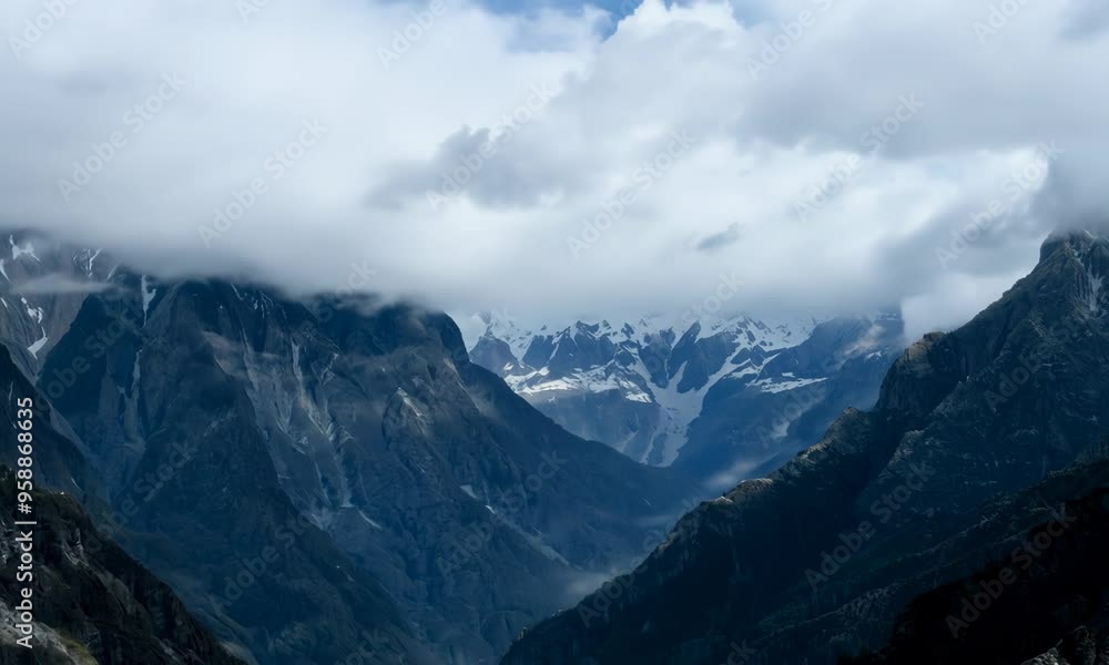 Majestic mountain landscape with clouds rolling in. Video Majestic mountain landscape with clouds rolling in. Video