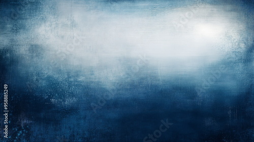 A textured dreamy background of dark blue merging with soft, misty whites