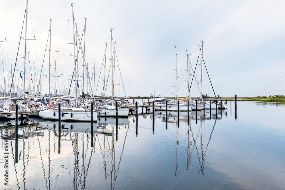 Fototapeta premium Sailboat and yacht port in Heiligenhafen, Germany, for summer vacationers on the Baltic Sea