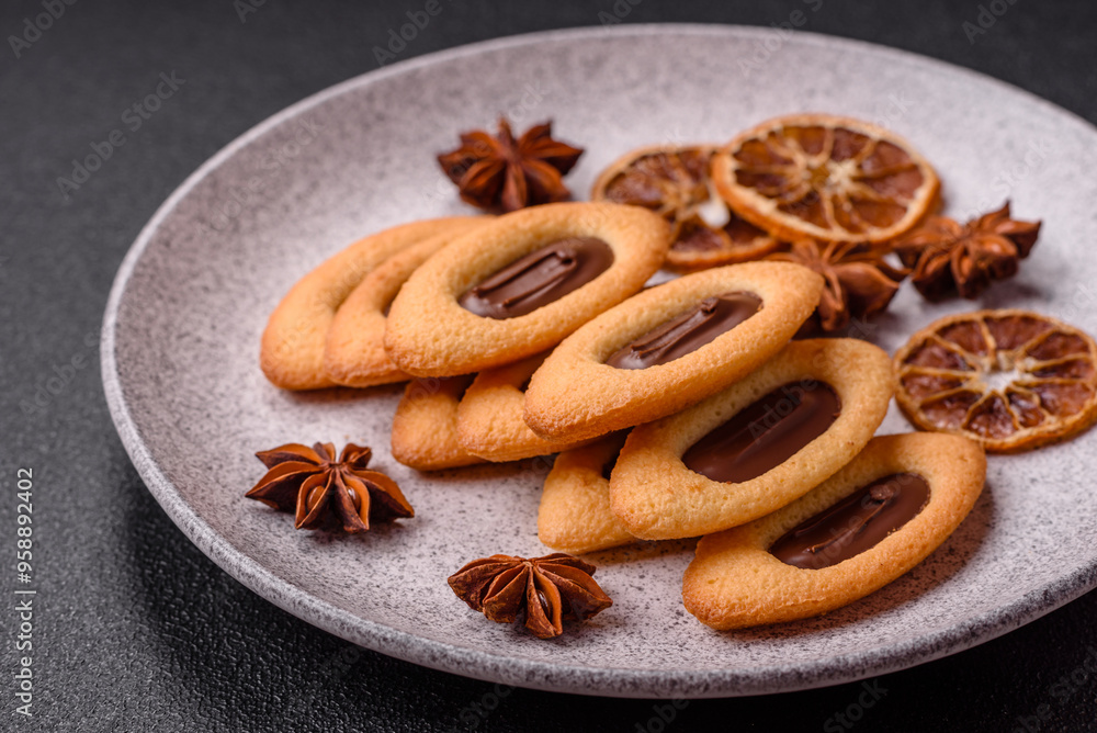 Delicious sweet crispy cookies with chocolate filling in the center Delicious sweet crispy cookies with chocolate filling in the center