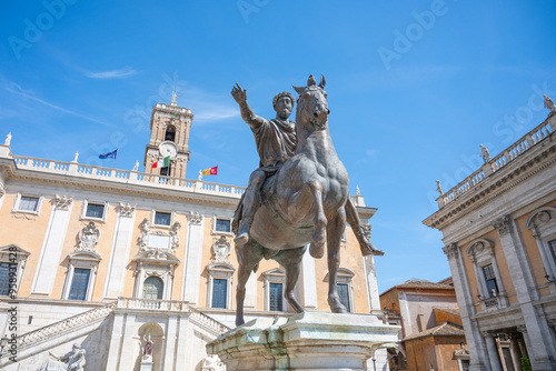 Bild auf Leinwand The Equestrian Statue of Marcus Aurelius stands majestically on Capitoline Hill in Rome, symbolizing power and leadership against a backdrop of clear blue skies