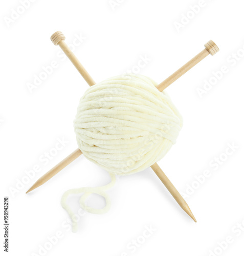 Skein of soft yarn and knitting needles isolated on white