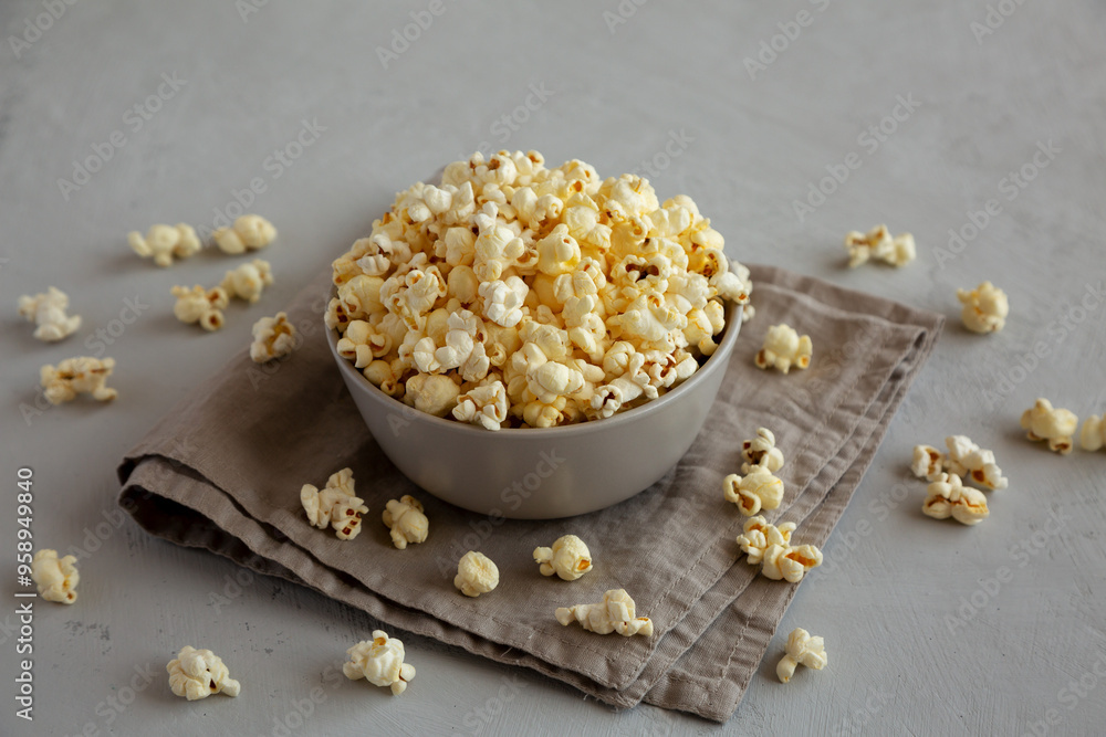 Homemade Salty Popcorn in a Bowl, side view. Homemade Salty Popcorn in a Bowl, side view.