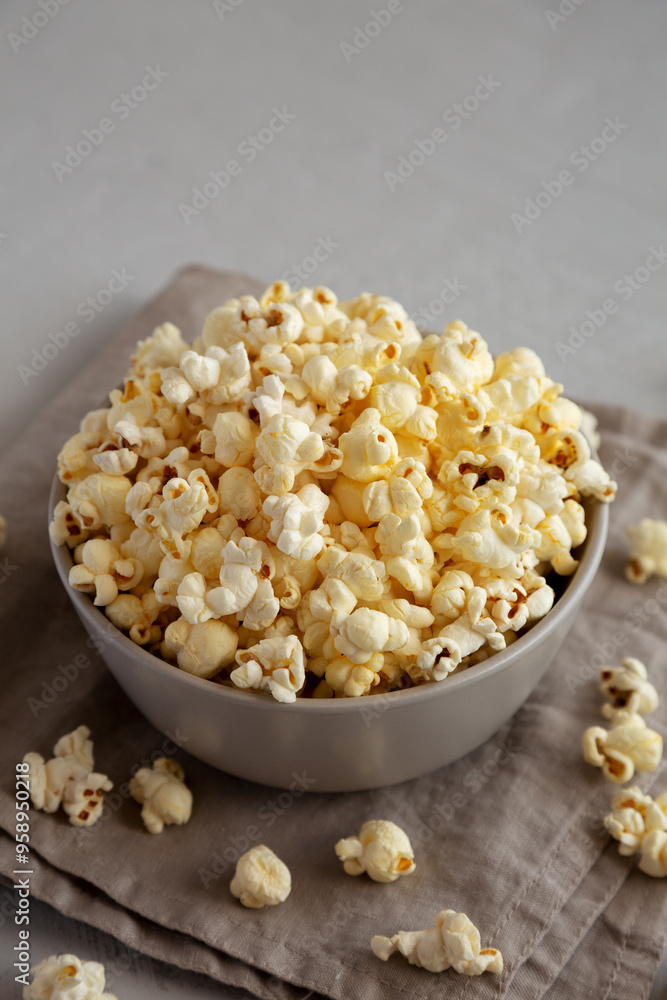 Homemade Salty Popcorn in a Bowl, side view. Homemade Salty Popcorn in a Bowl, side view.