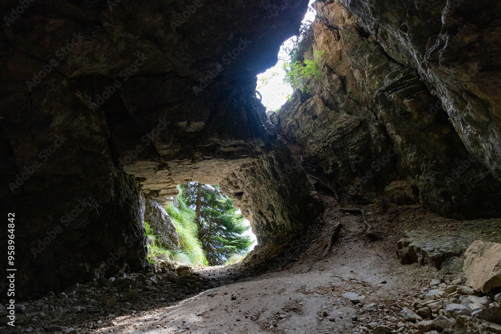 Hiking on Road of 52 Tunnels on the Pasubio massif in Veneto, Italy Hiking on Road of 52 Tunnels on the Pasubio massif in Veneto, Italy