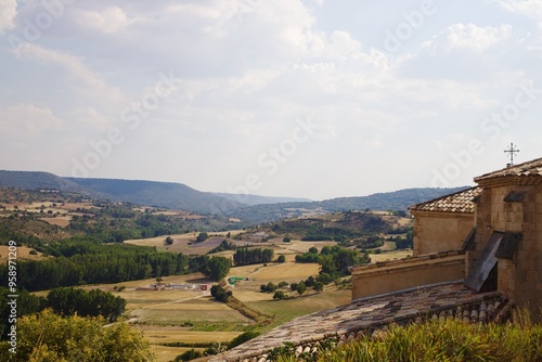 Wallpaper Mural landscape view of a field with a church Torontodigital.ca