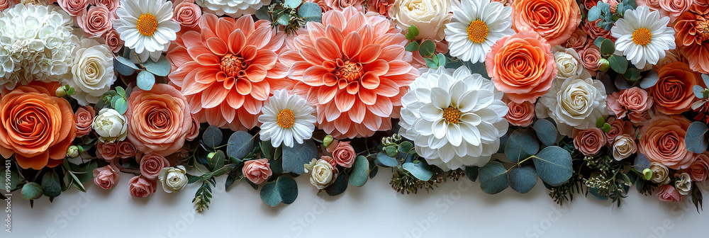 A beautiful arrangement of peach and white flowers with eucalyptus leaves. A beautiful arrangement of peach and white flowers with eucalyptus leaves.