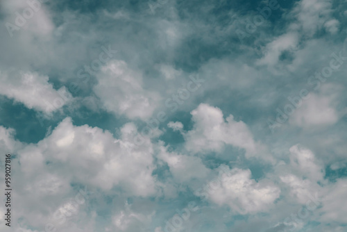 Beautiful blue sky with white Altocumulus undulatus clouds.