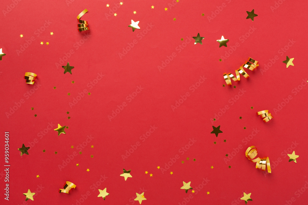 Golden confetti on color background, top view Golden confetti on color background, top view