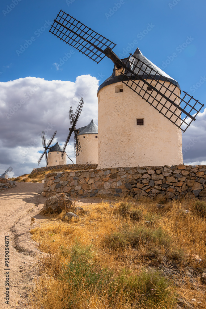 Beautiful exposure of the Windmills of Consuegra at Sunrise located on Castilla-La Mancha, Spain. Beautiful exposure of the Windmills of Consuegra at Sunrise located on Castilla-La Mancha, Spain.