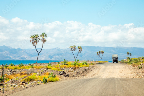 Road along Tadjourah gulf with mountains in the background, Tajourah, Djibouti photo