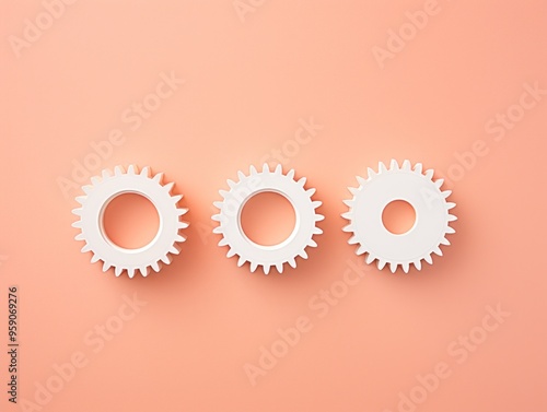 Three white gears on a Coral background, laid flat, copy space concept for business technology and development in the abstract vector with copy space 