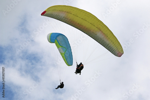 Wallpaper Mural Tandem Paraglider flying in a cloudy sky Torontodigital.ca