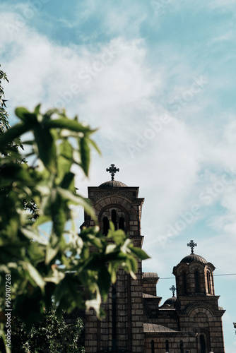 St. Mark's Temple Orthodox Church located in the Tasmajdan park. Belgrade, Serbia - 08.30.2024. Summertime in popular touristic place. photo