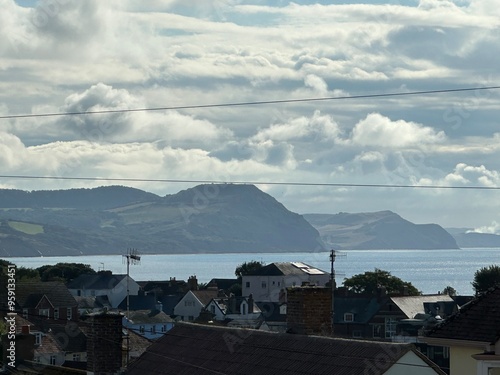 clouds over the town of Lyme Regis Dorset England  photo