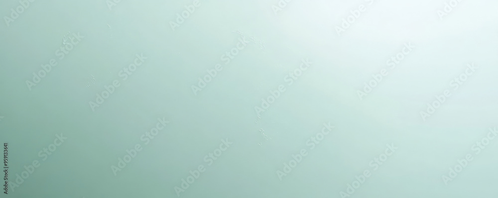 A light seafoam-green surface with a smooth, polished texture. The cool pastel tone and sleek texture add a modern and clean feel to the background. A light seafoam-green surface with a smooth, polished texture. The cool pastel tone and sleek texture add a modern and clean feel to the background.