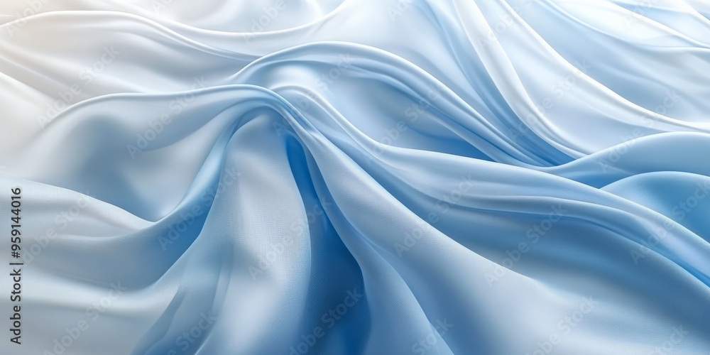 Obraz premium An elegant abstract background with flowing 3D silk fabric in gradient shades of icy blue to white. The fabric’s texture creates a refined, modern appearance.