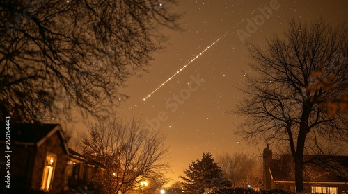 Geminid meteor shower with multiple bright streaks in night sky photo