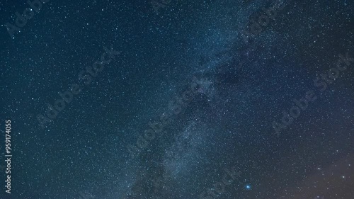 Wallpaper Mural The Milky Way moving across the night sky. Captures the mesmerizing motion of stars and cosmic detail in a clear, dark sky Torontodigital.ca