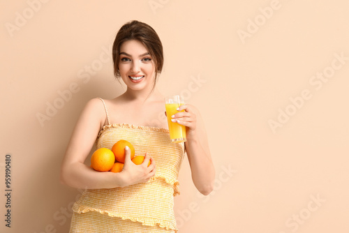 Young woman with glass of j...