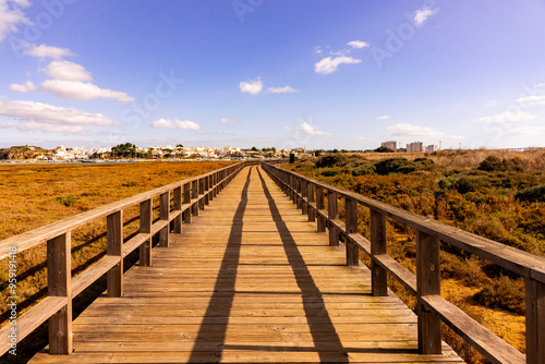 Sunny Escape at Passadicos de Alvor: A Serene Walk Above Lagoa de Alvor