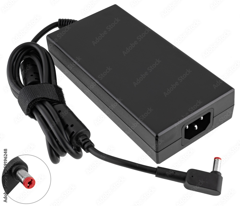Power adapter for laptop, on white background in insulation Power adapter for laptop, on white background in insulation