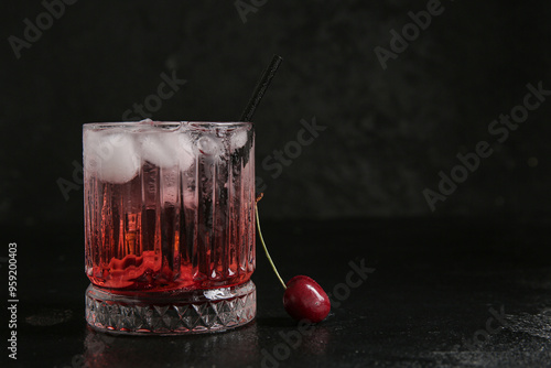 Refreshing red cocktail wit...