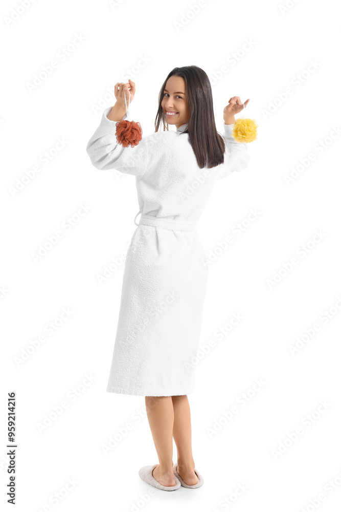 Young woman in bathrobe with loofahs on white background, back view Young woman in bathrobe with loofahs on white background, back view