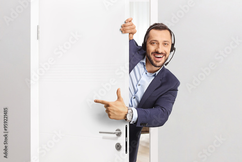 Call operator with a headset opening a door