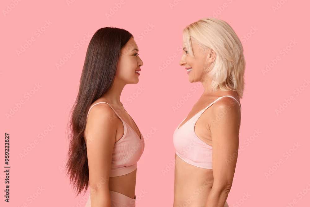 Beautiful happy body positive women on pink background Beautiful happy body positive women on pink background