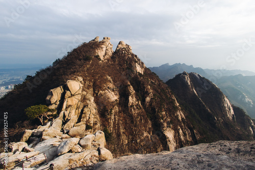 Bukhansan National Park, Seoul, Gyeonggi-do, South Korea, spring landscape view during hike to Baegundae summit peak, process of trekking and climbing to Bukhan mountain, travel and hiking in Korea