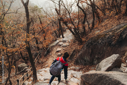 Bukhansan National Park, Seoul, Gyeonggi-do, South Korea, spring landscape view during hike to Baegundae summit peak, process of trekking and climbing to Bukhan mountain, travel and hiking in Korea photo